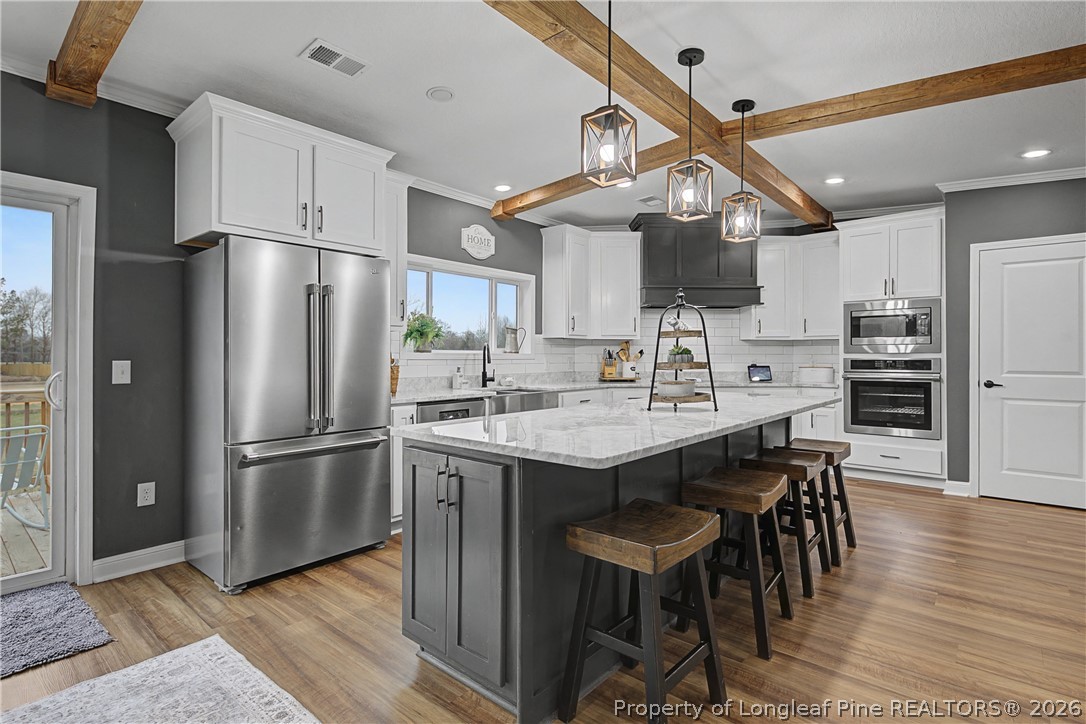 9109 Chicken Foot Road St. Pauls, NC 28384 - Photo 15 of 50 Open kitchen with large island