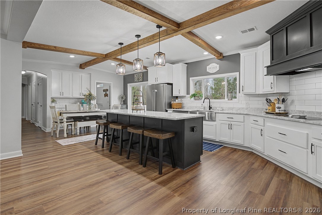 9109 Chicken Foot Road St. Pauls, NC 28384 - Photo 16 of 50 Granite countertops and tile backsplash