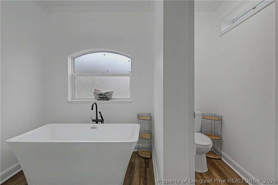 9109 Chicken Foot Road St. Pauls, NC 28384 - Photo 32 of 50 Relaxing garden tub, separate toilet room with door