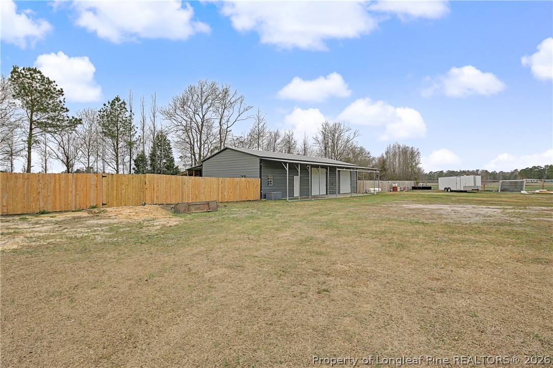 9109 Chicken Foot Road St. Pauls, NC 28384 - Photo 41 of 50 30x60 3 door garage/ shop with water and power