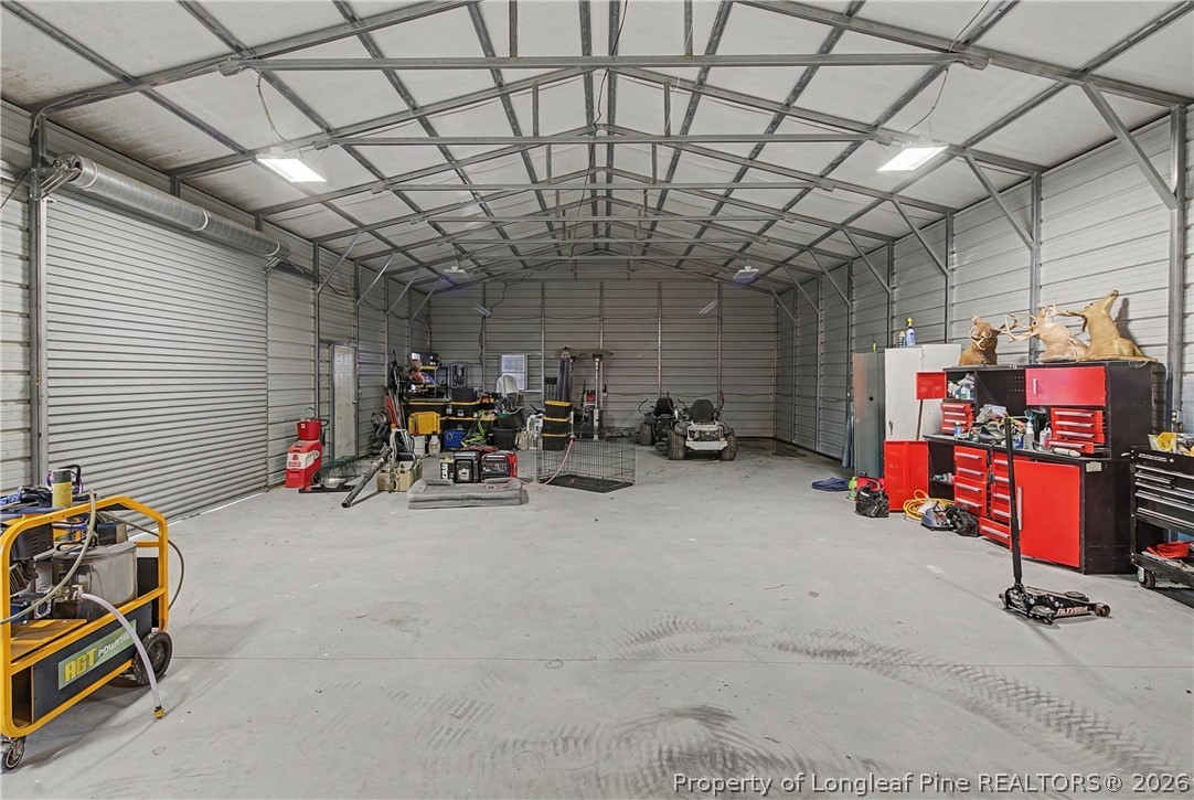 9109 Chicken Foot Road St. Pauls, NC 28384 - Photo 42 of 50 30x60 3 door garage/ shop with water and power