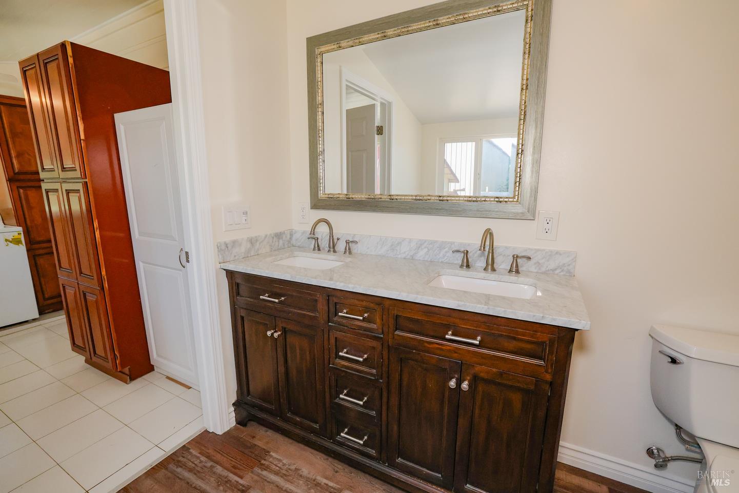 7948 North Meridian Road Dixon, CA 95620 - Photo 27 of 59 a bathroom with a sink vanity and a mirror