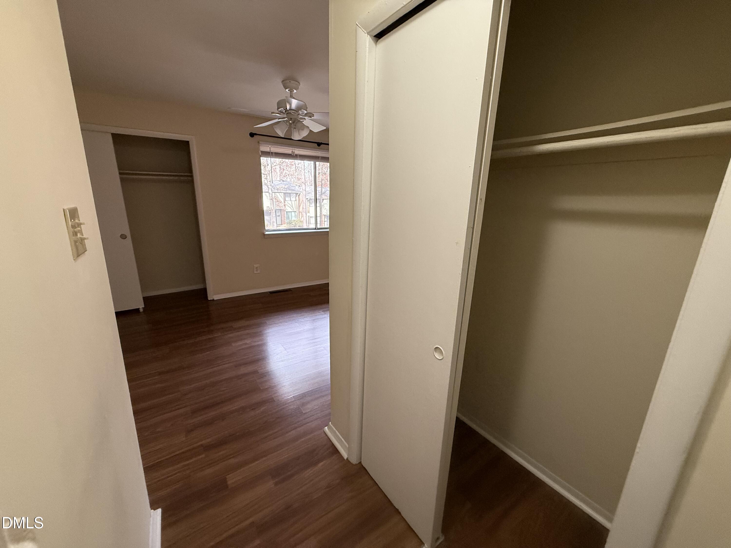1228 Teakwood Place Raleigh, NC 27606 - Photo 21 of 30 a view of entryway with wooden floor