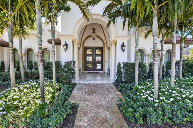 a house view with a garden space