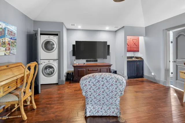 a view of a patio with table and chairs and potted plants