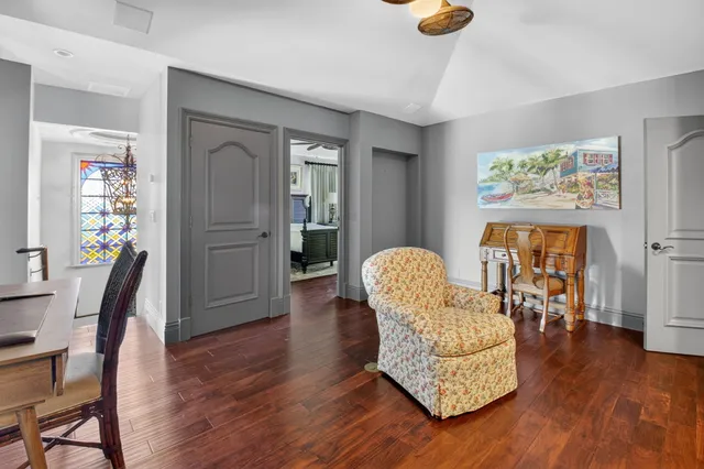 an aerial view of a houses with a yard