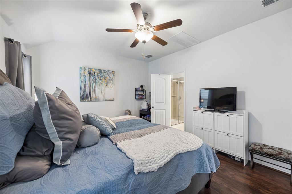 406 Madrone Lane Princeton, TX 75407 - Photo 13 of 30 Primary Bedroom featuring wood-finish flooring and a ceiling fan with integrated lighting