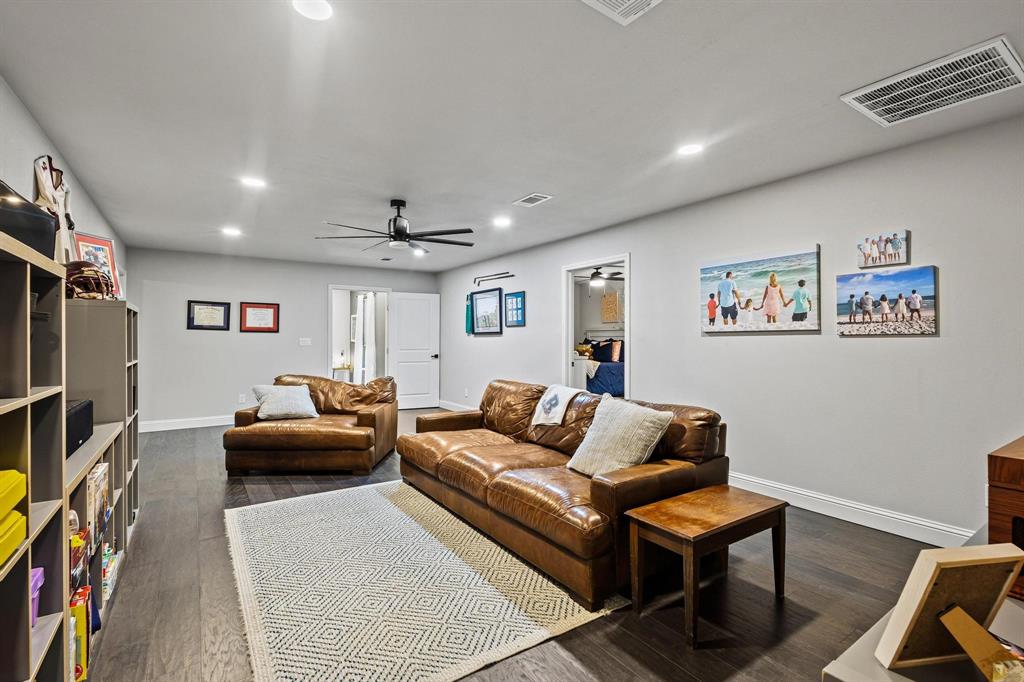979 Mitchell Road Sherman, TX 75090 - Photo 19 of 40 Living room featuring dark wood finished floors, recessed lighting, and ceiling fan