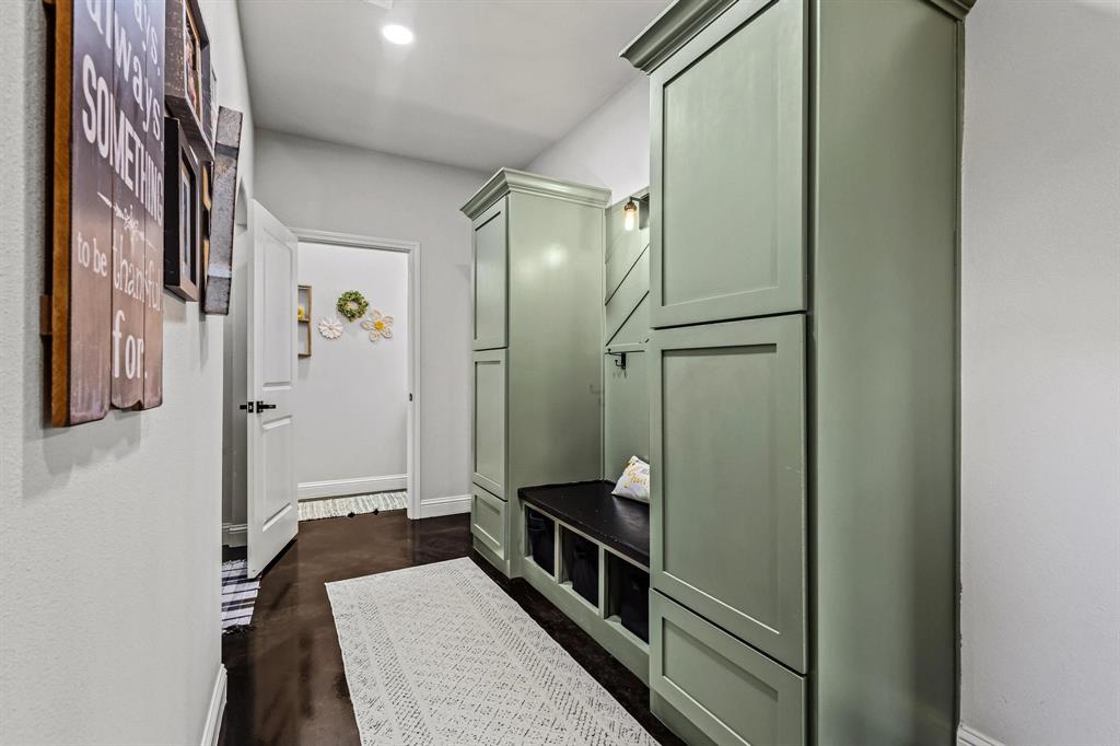 979 Mitchell Road Sherman, TX 75090 - Photo 27 of 40 Mudroom featuring baseboards and dark wood-style floors