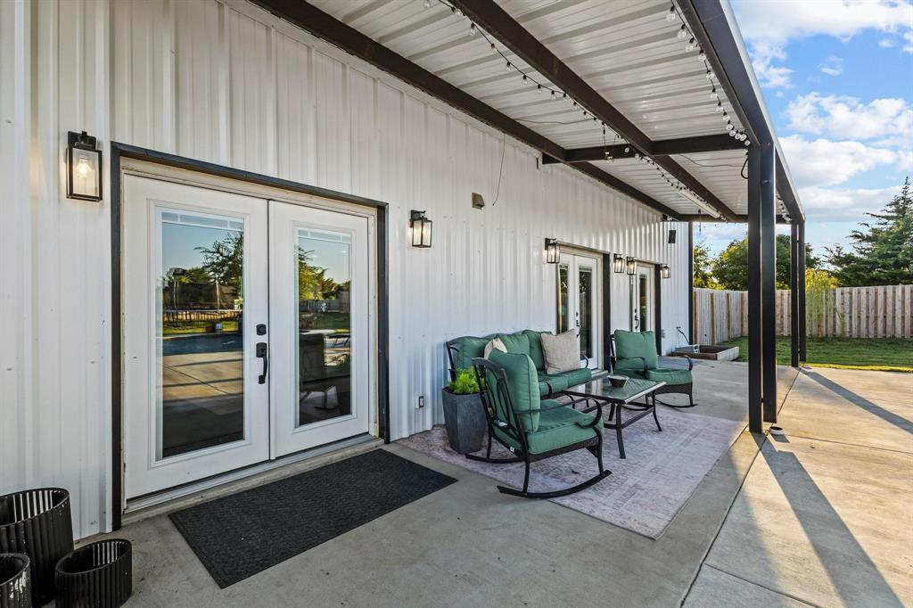 979 Mitchell Road Sherman, TX 75090 - Photo 29 of 40 Entrance to property with french doors and a patio area
