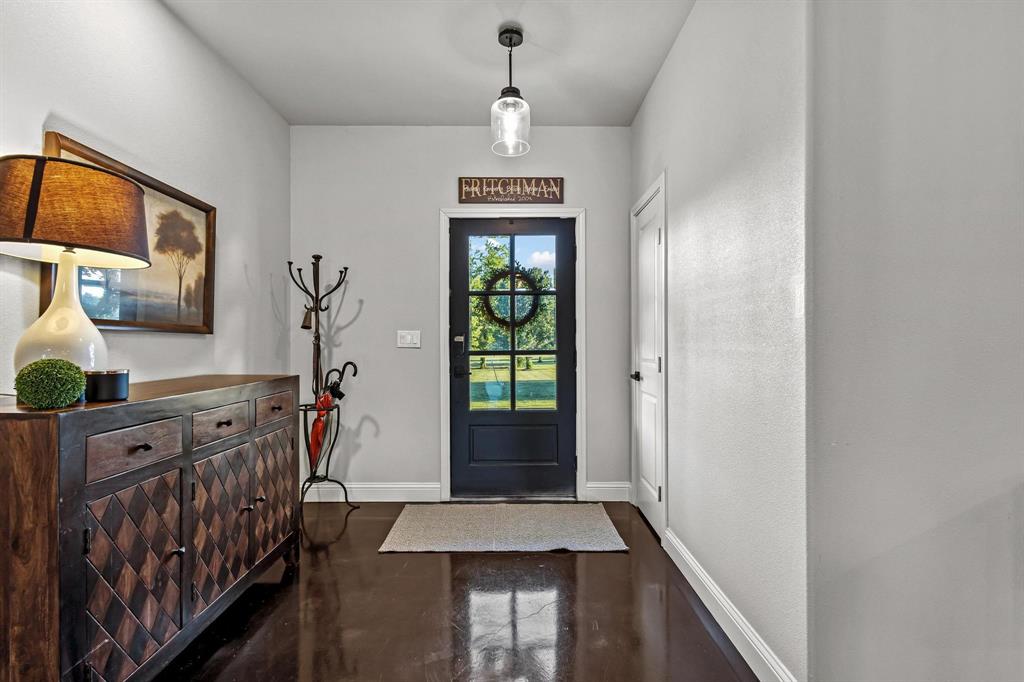 979 Mitchell Road Sherman, TX 75090 - Photo 4 of 40 Foyer featuring baseboards