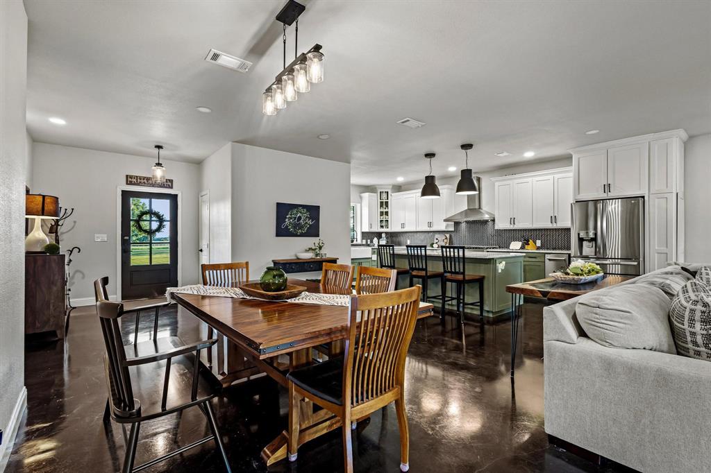 979 Mitchell Road Sherman, TX 75090 - Photo 6 of 40 Dining area with finished concrete floors and recessed lighting