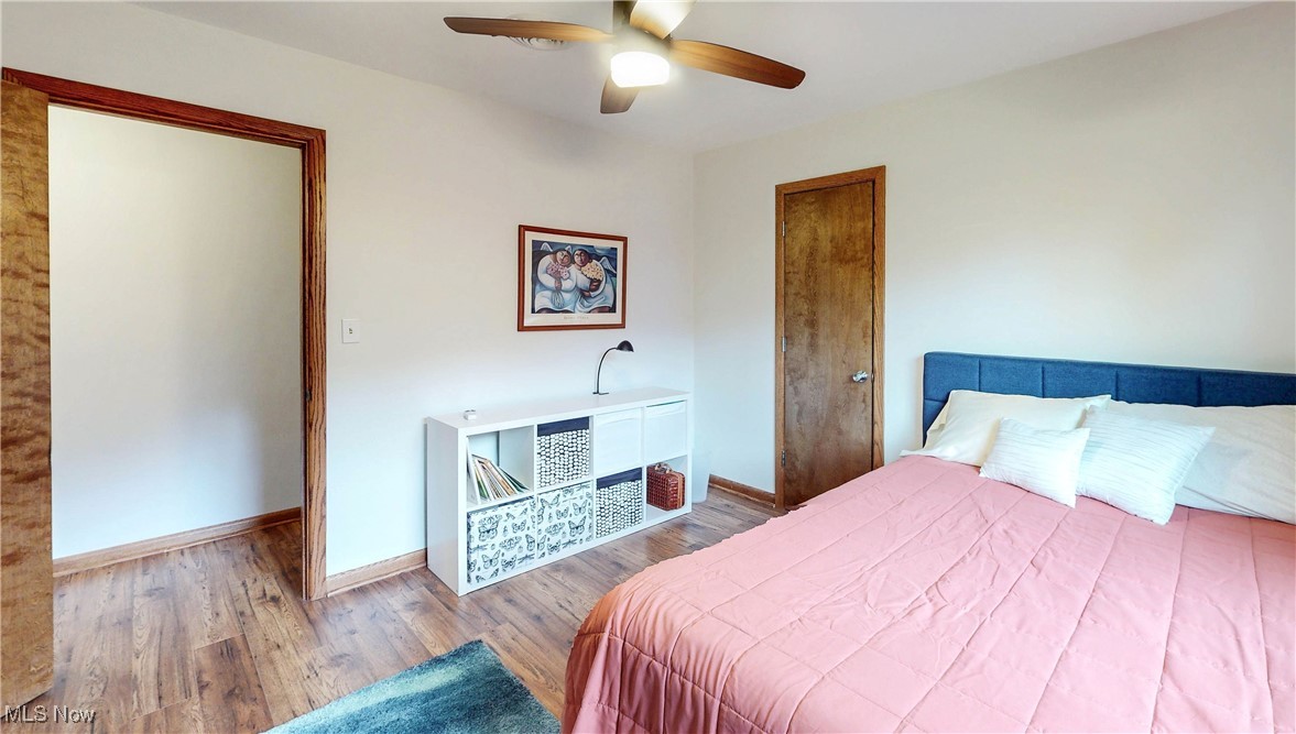 891 Sovereign Road Akron, OH 44303 - Photo 12 of 30 Bedroom featuring wood finished floors, baseboards, and a ceiling fan