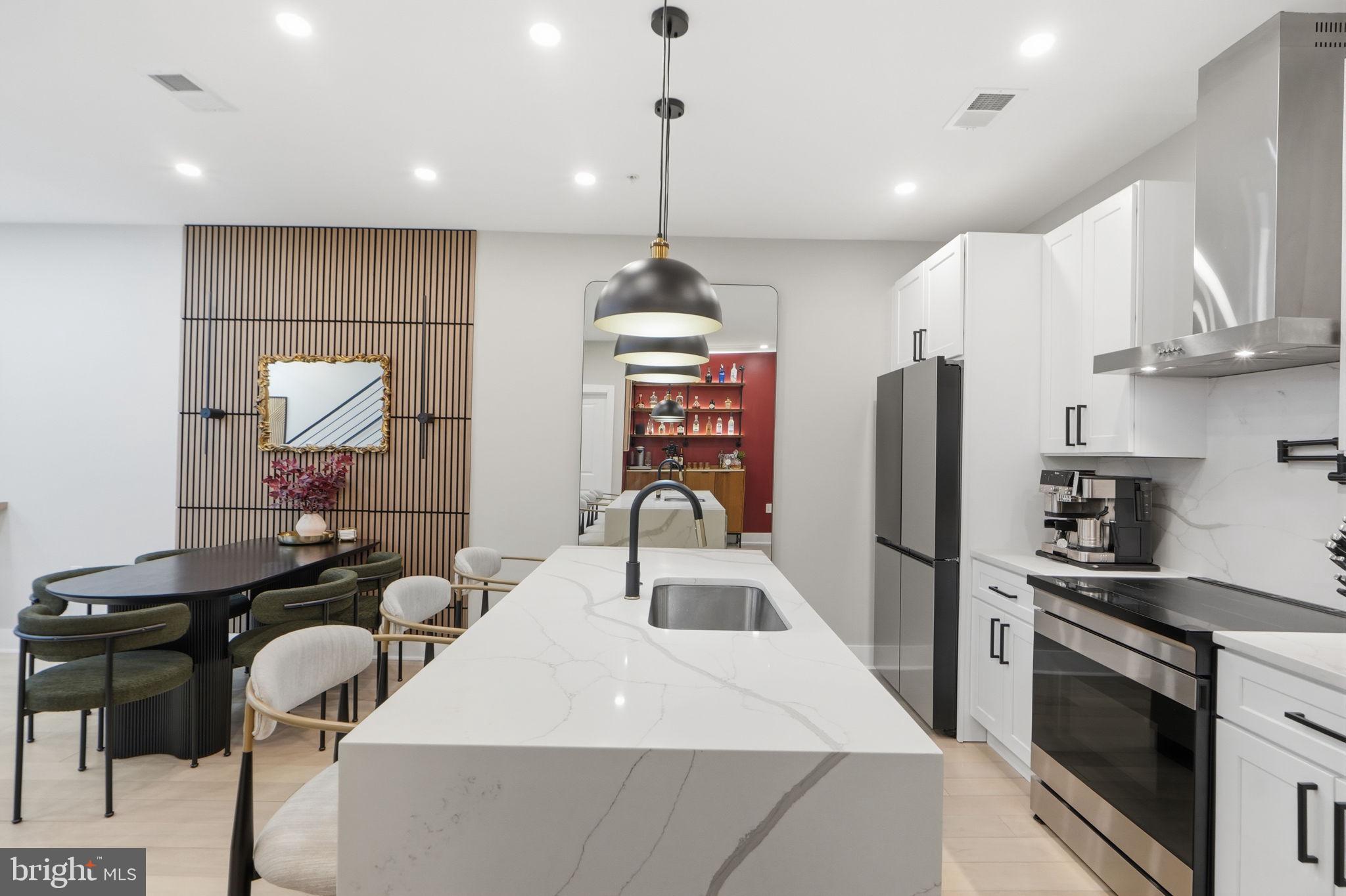 533 Shepherd Street Northwest Washington, DC 20011 - Photo 21 of 69 a kitchen with stainless steel appliances granite countertop a sink stove and refrigerator