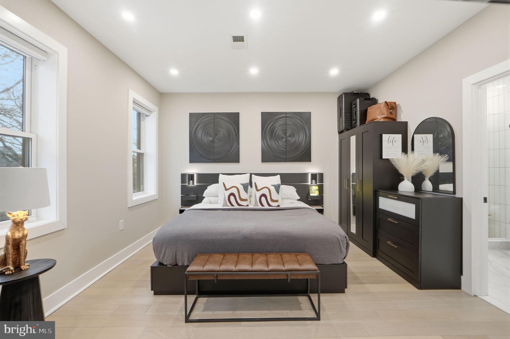 533 Shepherd Street Northwest Washington, DC 20011 - Photo 28 of 69 a bedroom with a bed and a tv on table