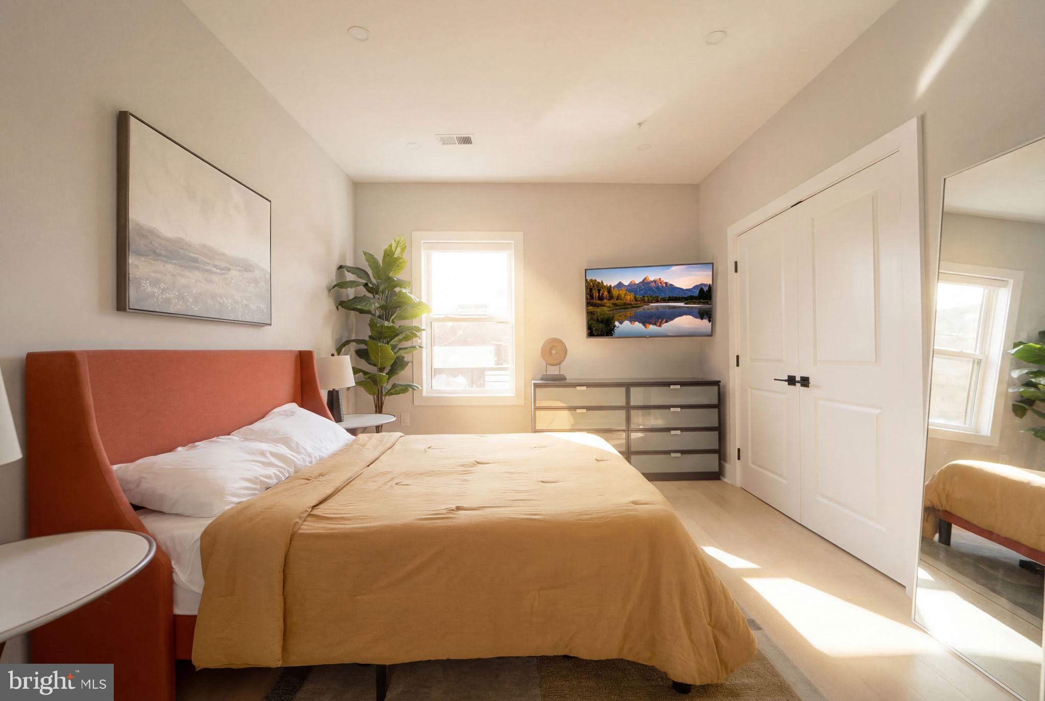 533 Shepherd Street Northwest Washington, DC 20011 - Photo 34 of 69 a bedroom with a bed and a couch