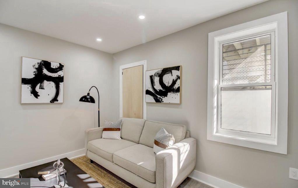 533 Shepherd Street Northwest Washington, DC 20011 - Photo 47 of 69 a living room with furniture and a window