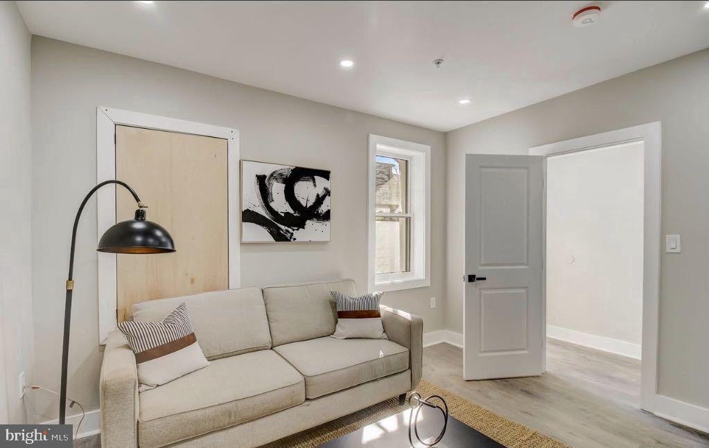 533 Shepherd Street Northwest Washington, DC 20011 - Photo 48 of 69 a living room with furniture and a window