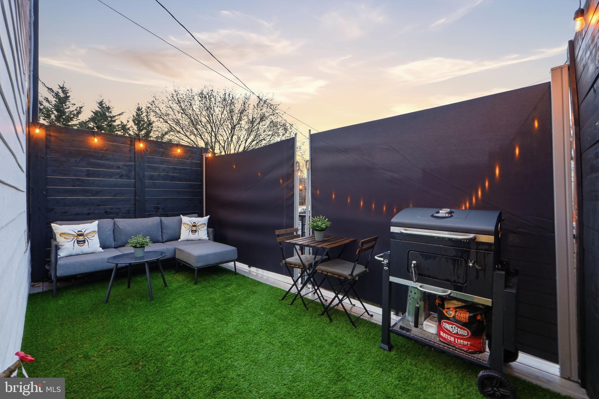 533 Shepherd Street Northwest Washington, DC 20011 - Photo 55 of 69 a backyard of a house with lots of green space