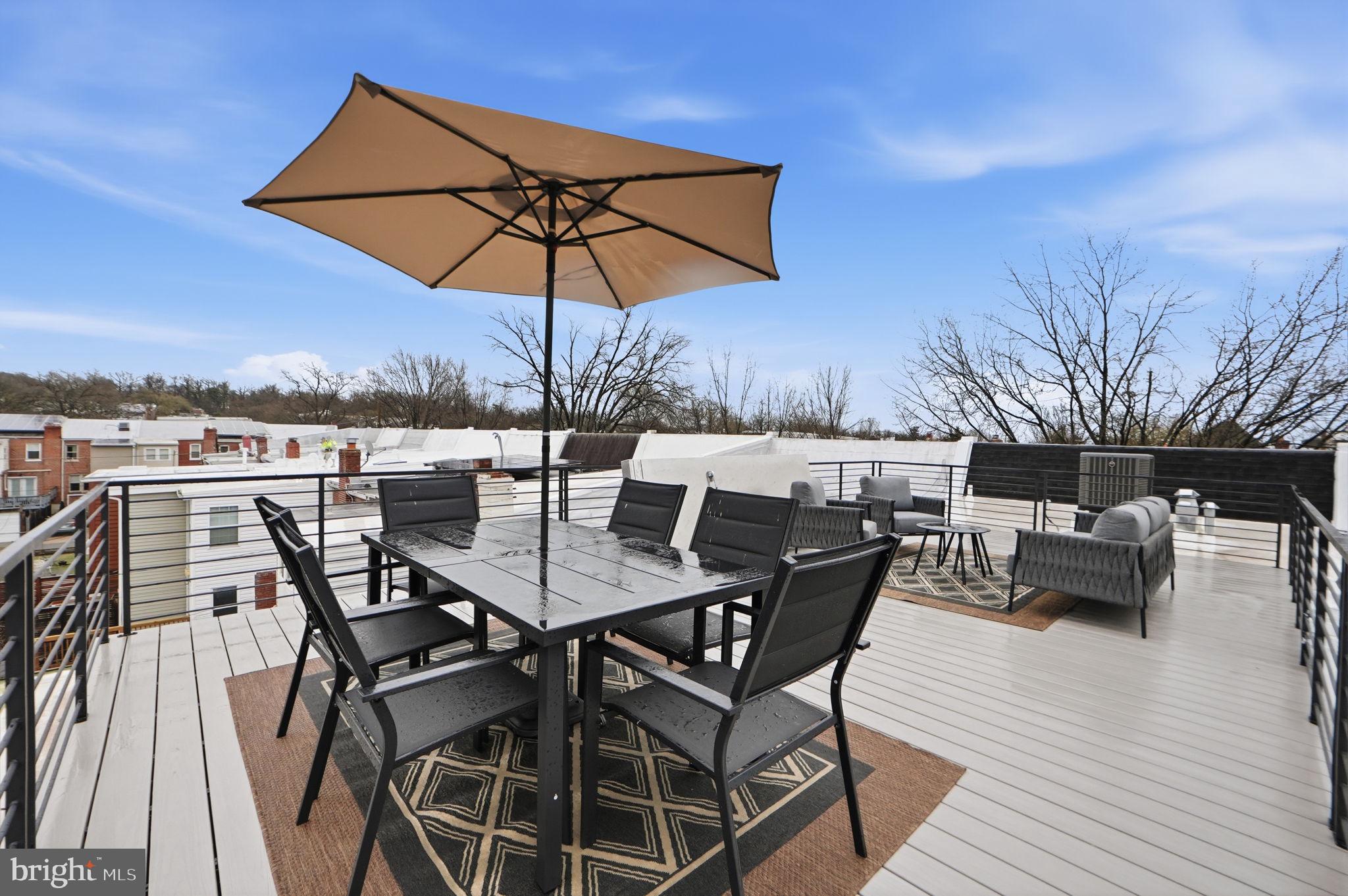 533 Shepherd Street Northwest Washington, DC 20011 - Photo 60 of 69 an outdoor space with furniture and umbrella