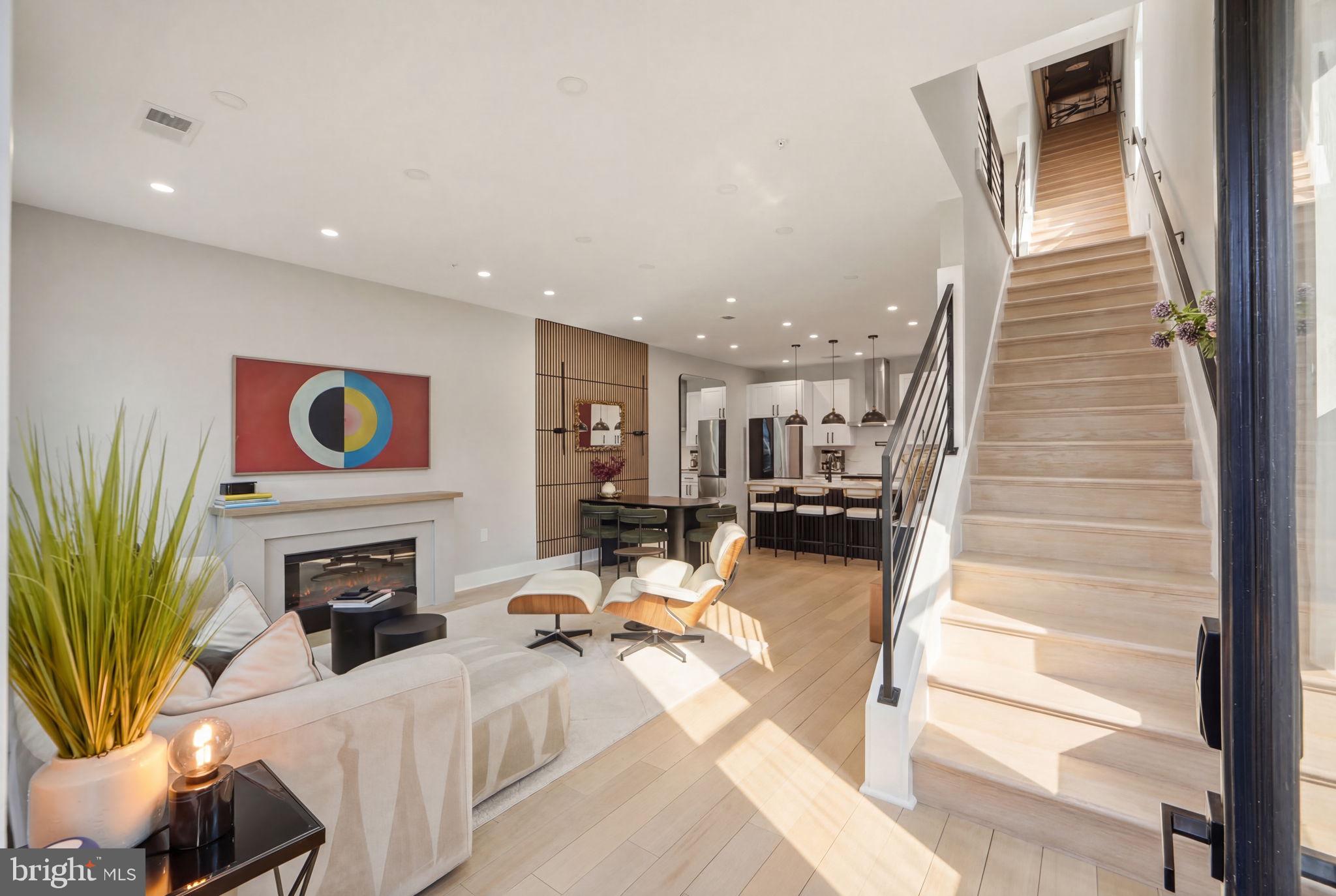 533 Shepherd Street Northwest Washington, DC 20011 - Photo 6 of 69 a living room with furniture and a fireplace