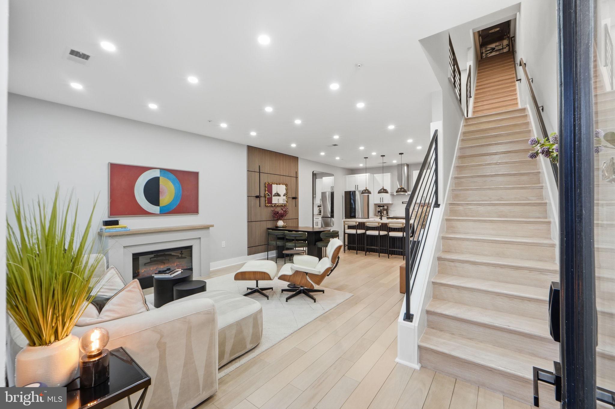 533 Shepherd Street Northwest Washington, DC 20011 - Photo 7 of 69 a living room with furniture and a fireplace