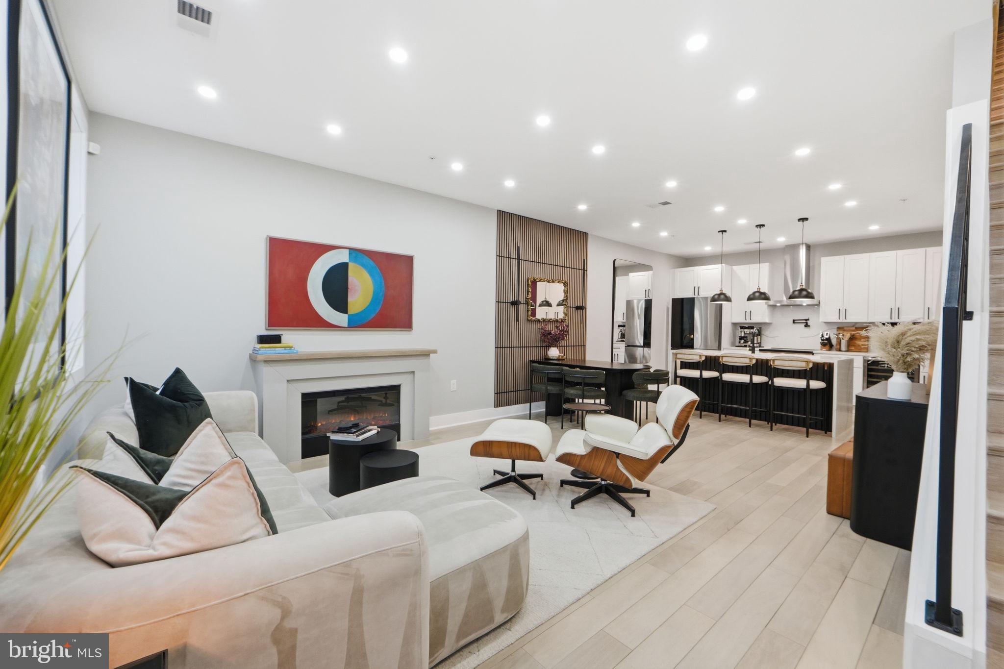 533 Shepherd Street Northwest Washington, DC 20011 - Photo 8 of 69 a living room with furniture and a fireplace