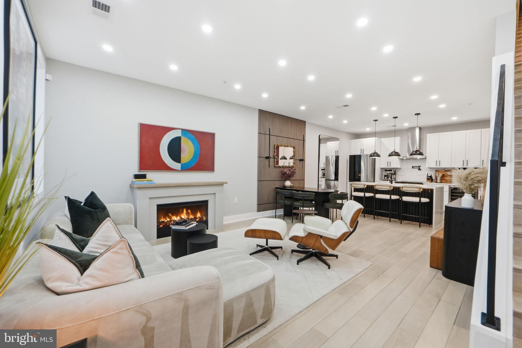 533 Shepherd Street Northwest Washington, DC 20011 - Photo 9 of 69 a living room with furniture and a fireplace