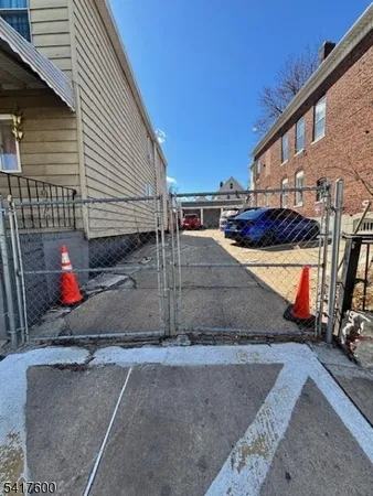 a view of a street with cars
