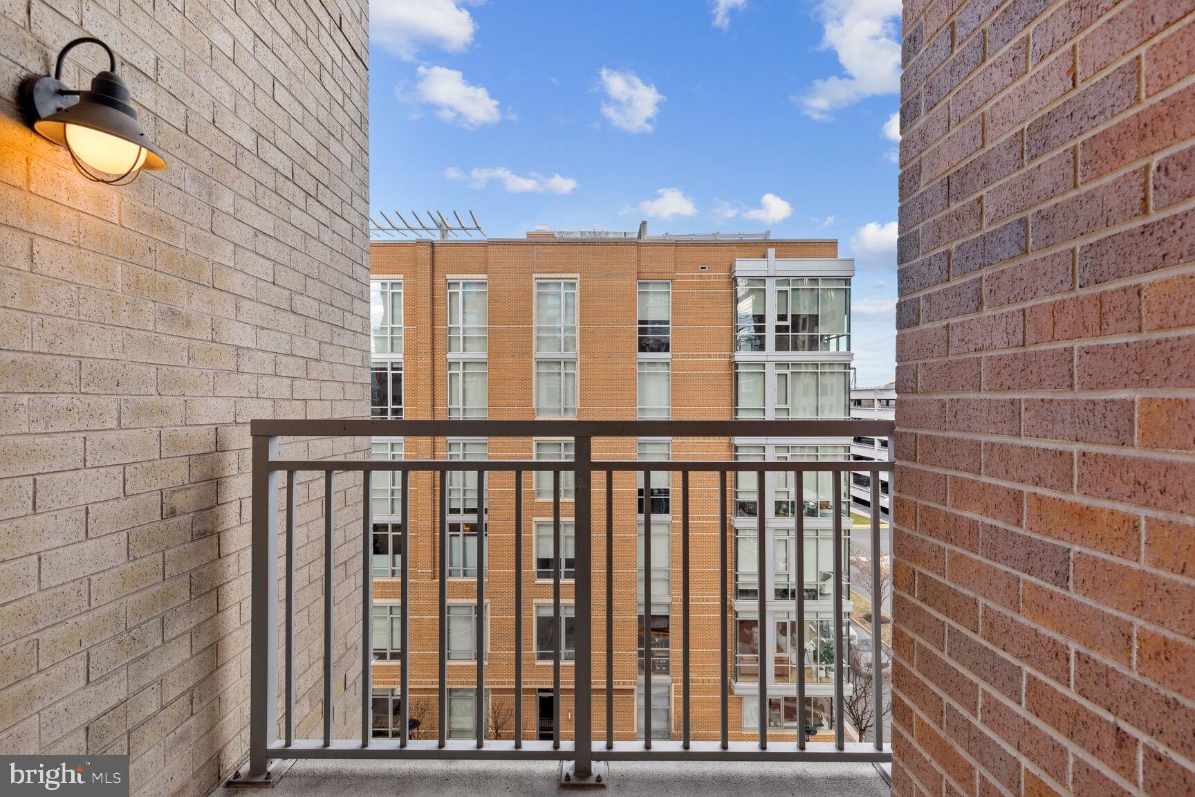 11990 Market Street, Unit 506 Reston, VA 20190 - Photo 8 of 39 Balcony off Dining Area