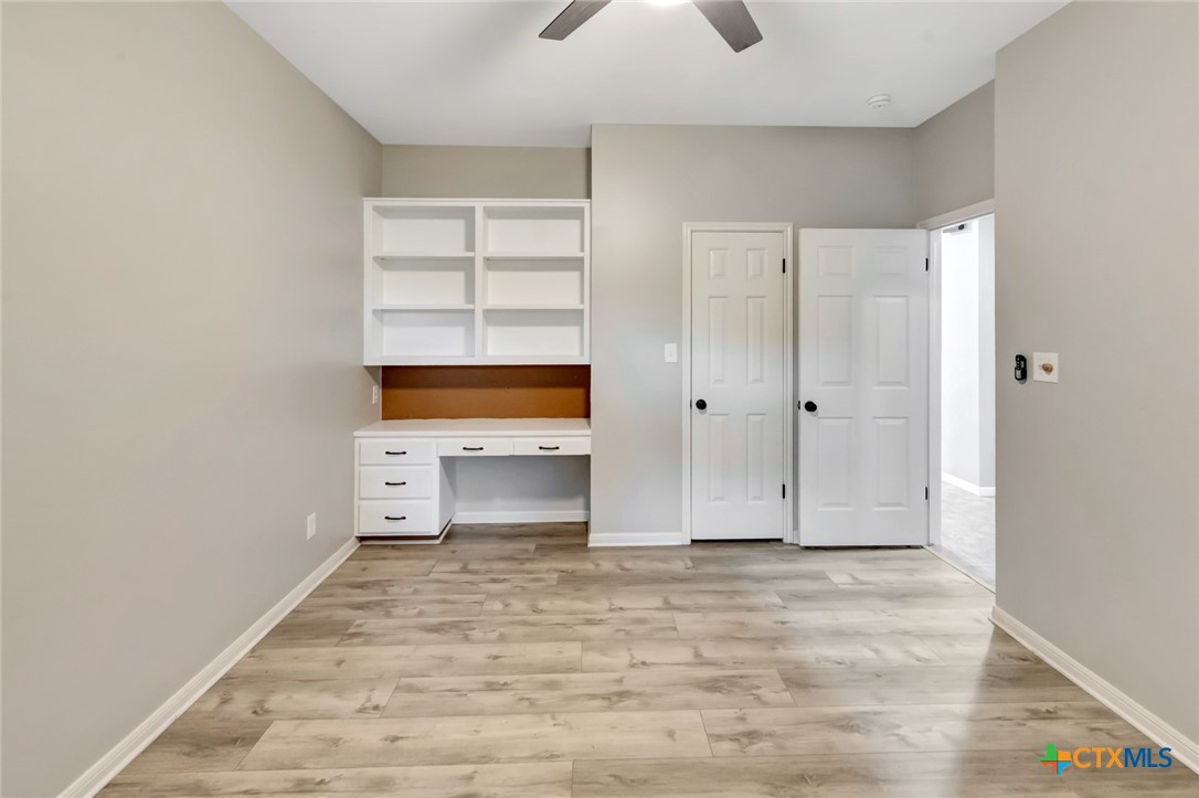 107 Masters Court Victoria, TX 77904 - Photo 25 of 48 Guest BR #2 Built-in desk & Spacious Closet