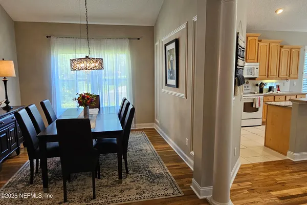 a view of a livingroom with furniture and front door