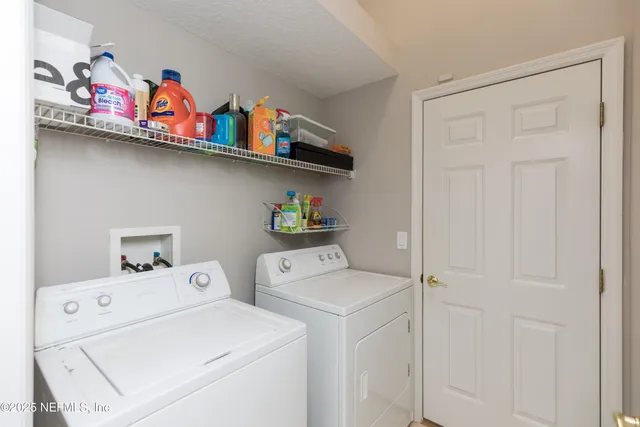 a view of balcony with wooden floor and outdoor seating