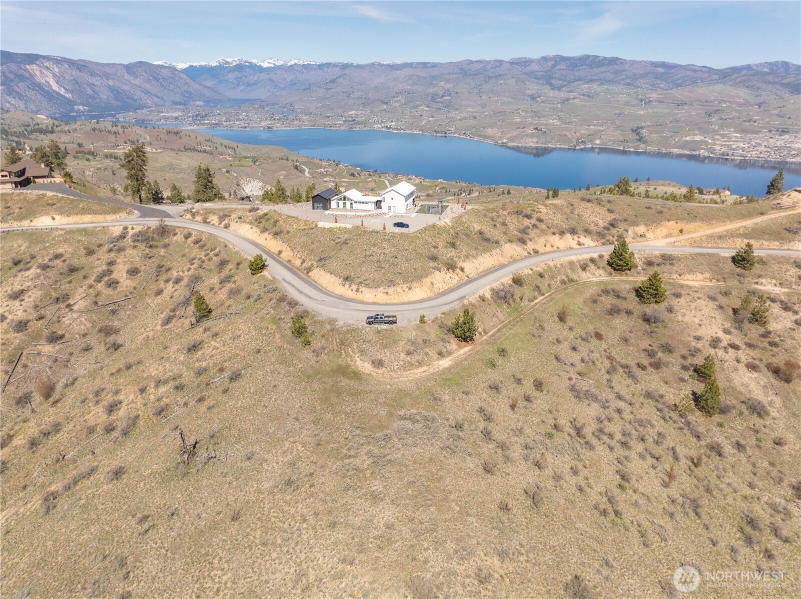 295 Hawks Ridge Road Chelan, WA 98816 - Photo 1 of 31 a view of ocean and mountain