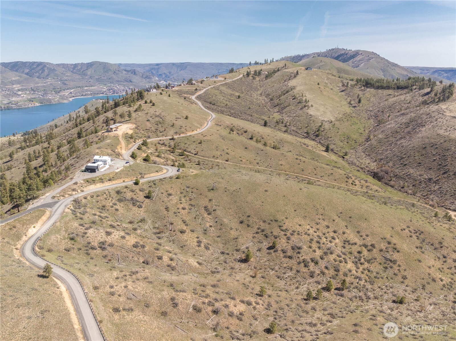 295 Hawks Ridge Road Chelan, WA 98816 - Photo 11 of 31 a view of a mountain in the distance