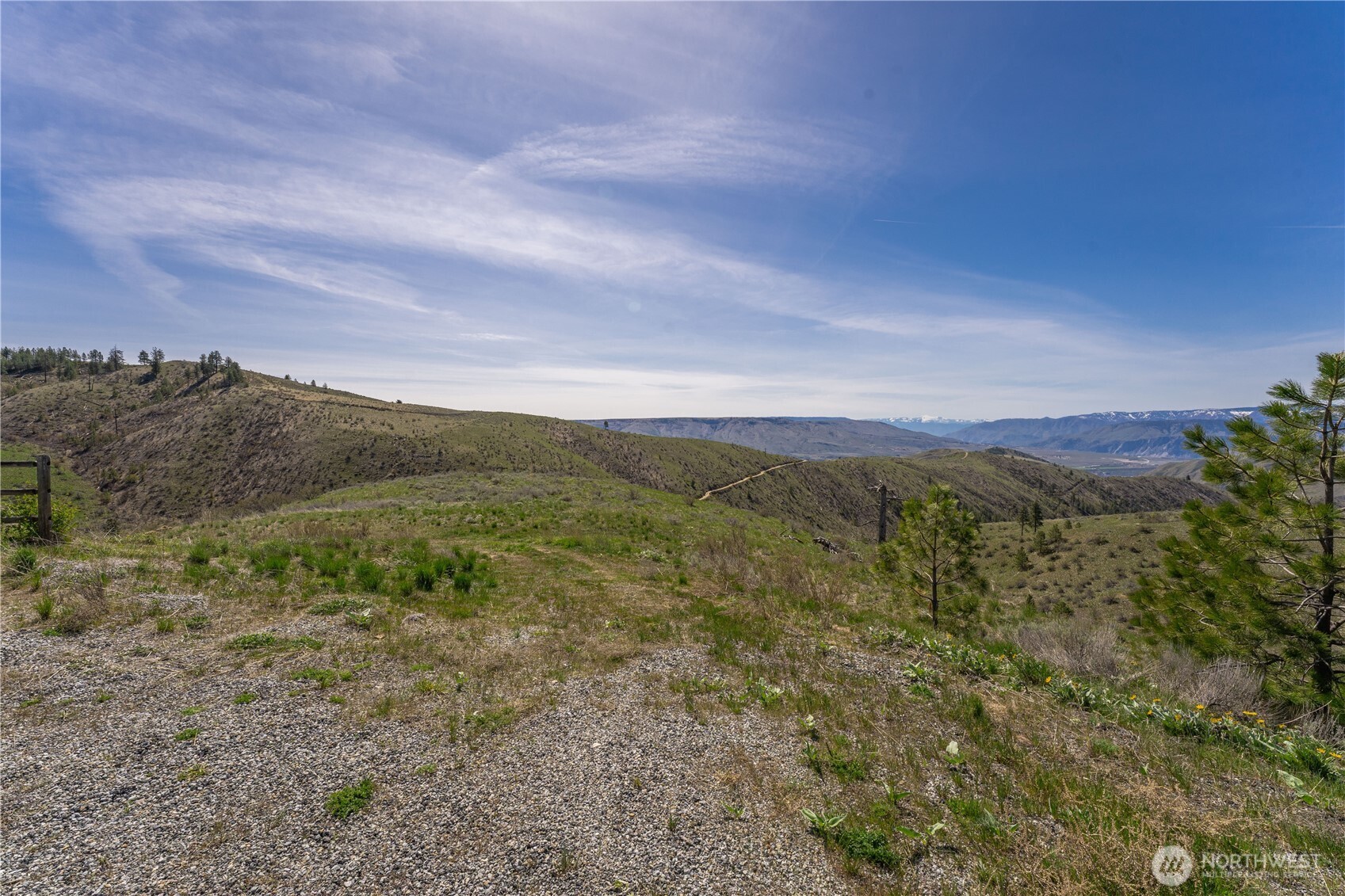 295 Hawks Ridge Road Chelan, WA 98816 - Photo 2 of 31 a view of an outdoor space with mountain view