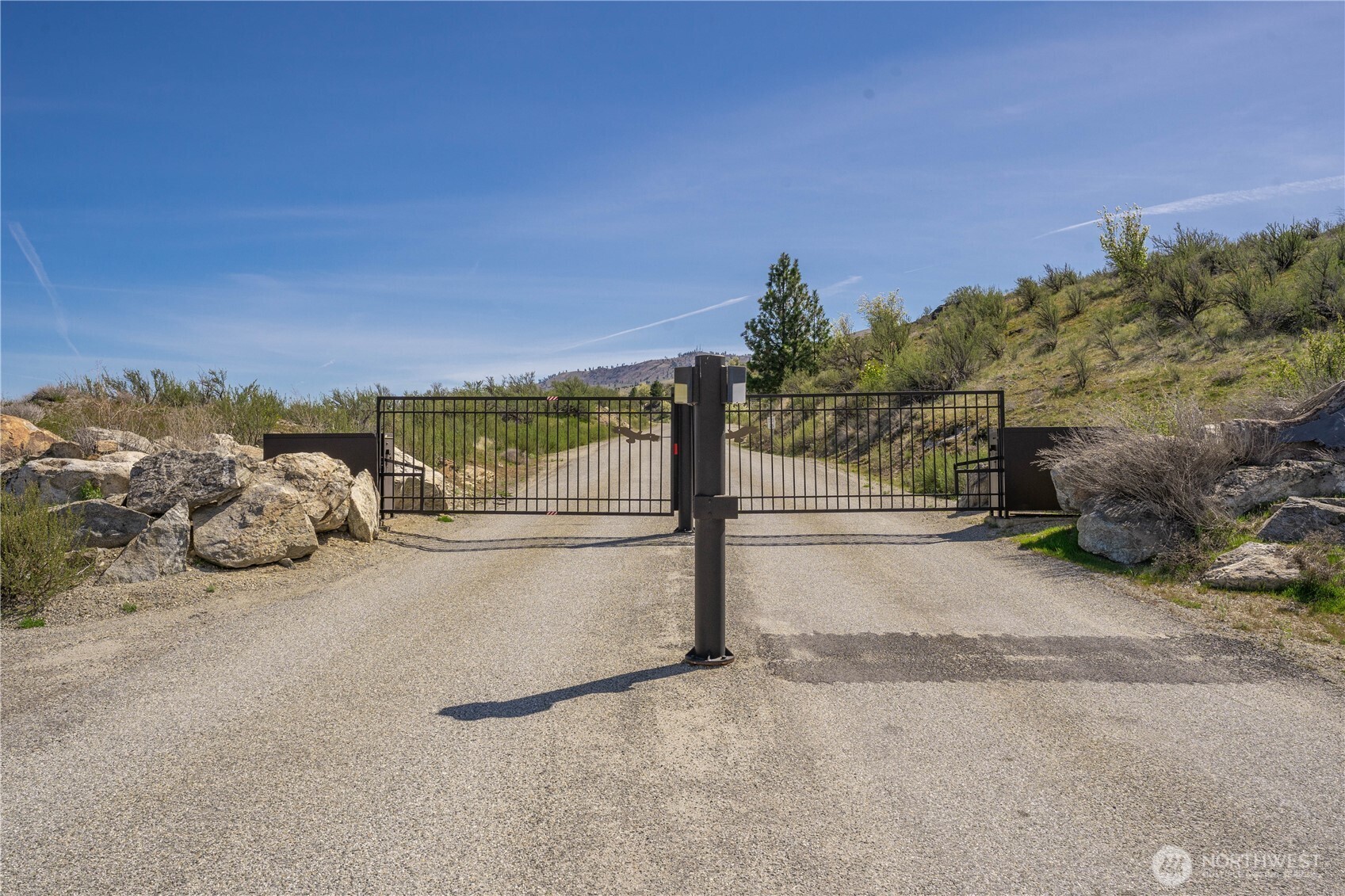 295 Hawks Ridge Road Chelan, WA 98816 - Photo 28 of 31 a view of a road with an ocean view