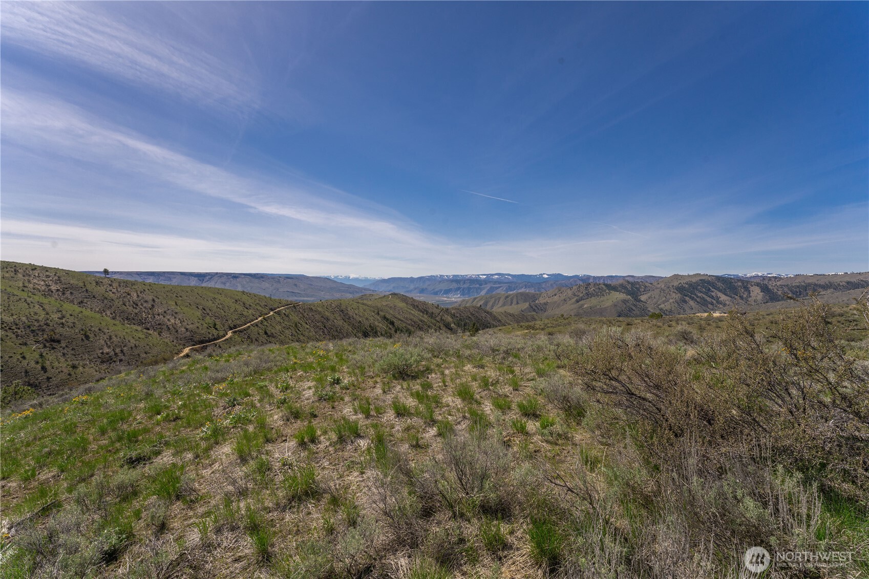 295 Hawks Ridge Road Chelan, WA 98816 - Photo 4 of 31 a view of mountain view with mountains in the background
