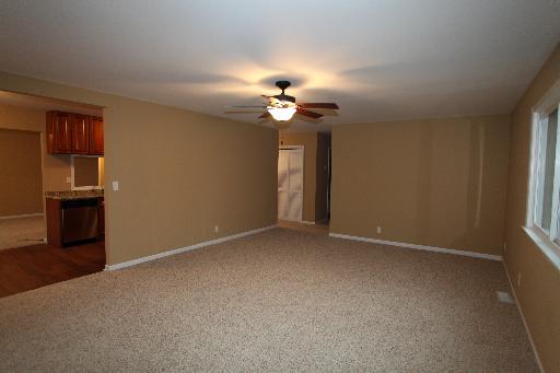 81 Seabury Road Bolingbrook, IL 60440 - Photo 8 of 10 a view of an empty room with a window