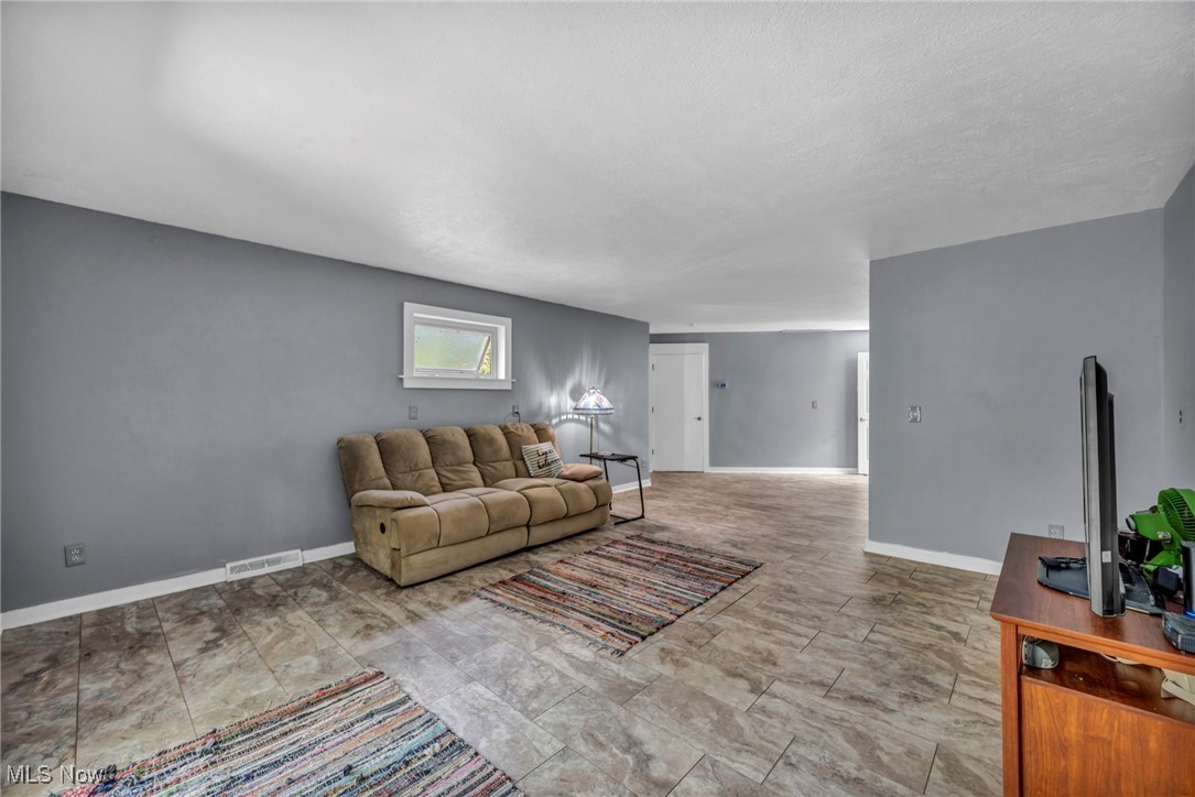 10982 Root Road Columbia Station, OH 44028 - Photo 10 of 49 Living room with baseboards