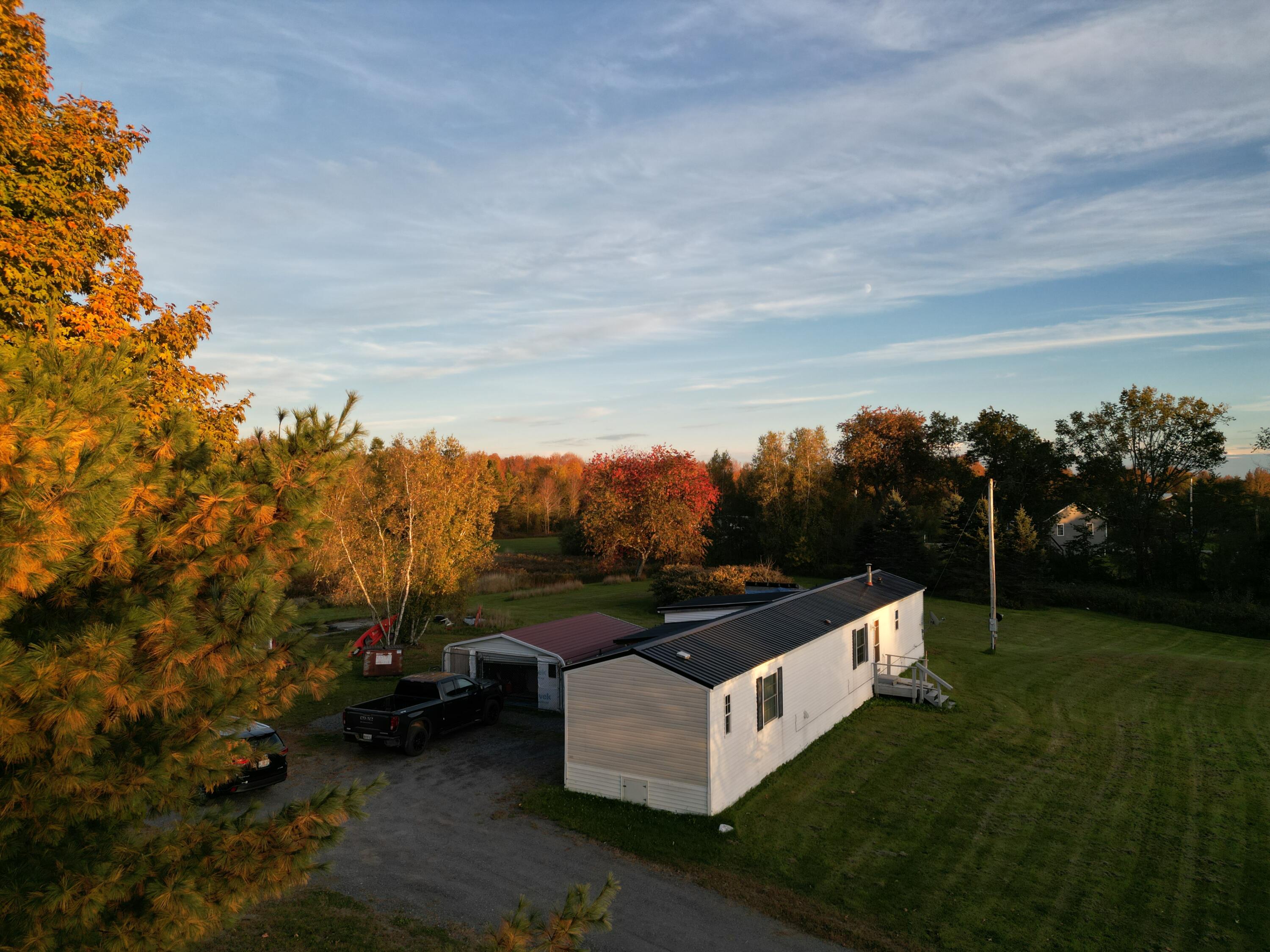 102 Reeves Road Bradford, ME 04410 - Photo 2 of 10 dji_fly_20221004_185128_350_166492065053