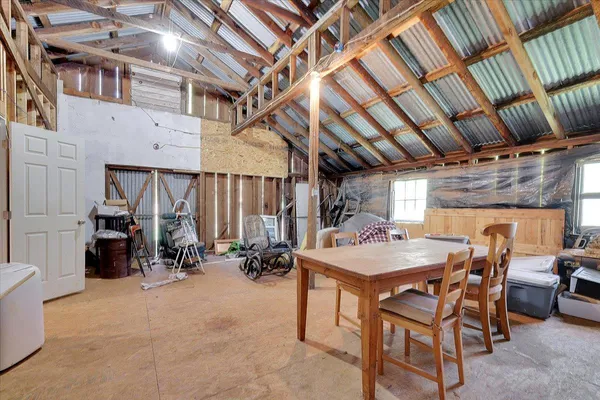 a dining room with furniture