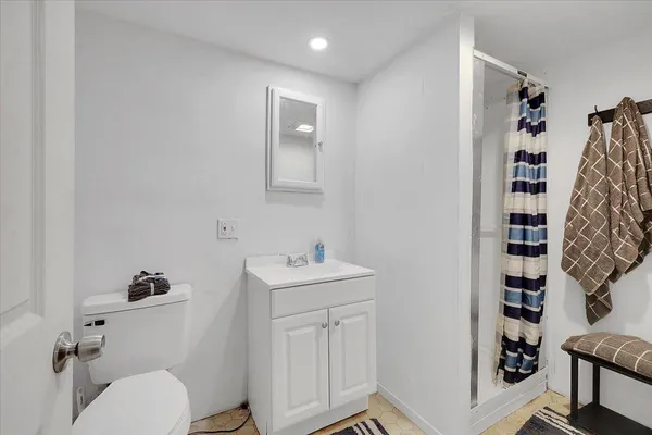 a utility room with dryer washer and a window