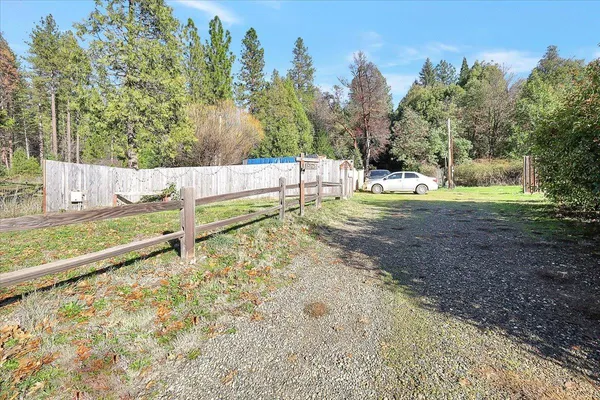 a view of backyard with green space