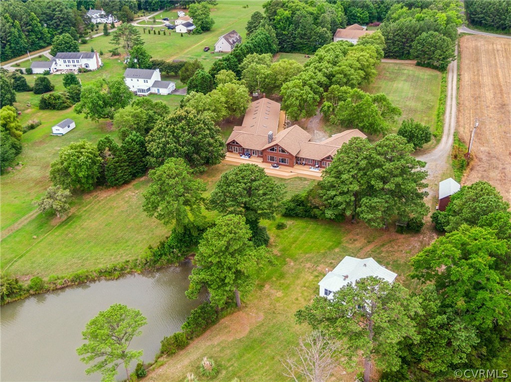 228 Field Point Road Moon, VA 23119 - Photo 45 of 49 an aerial view of lake residential houses with outdoor space and trees all around