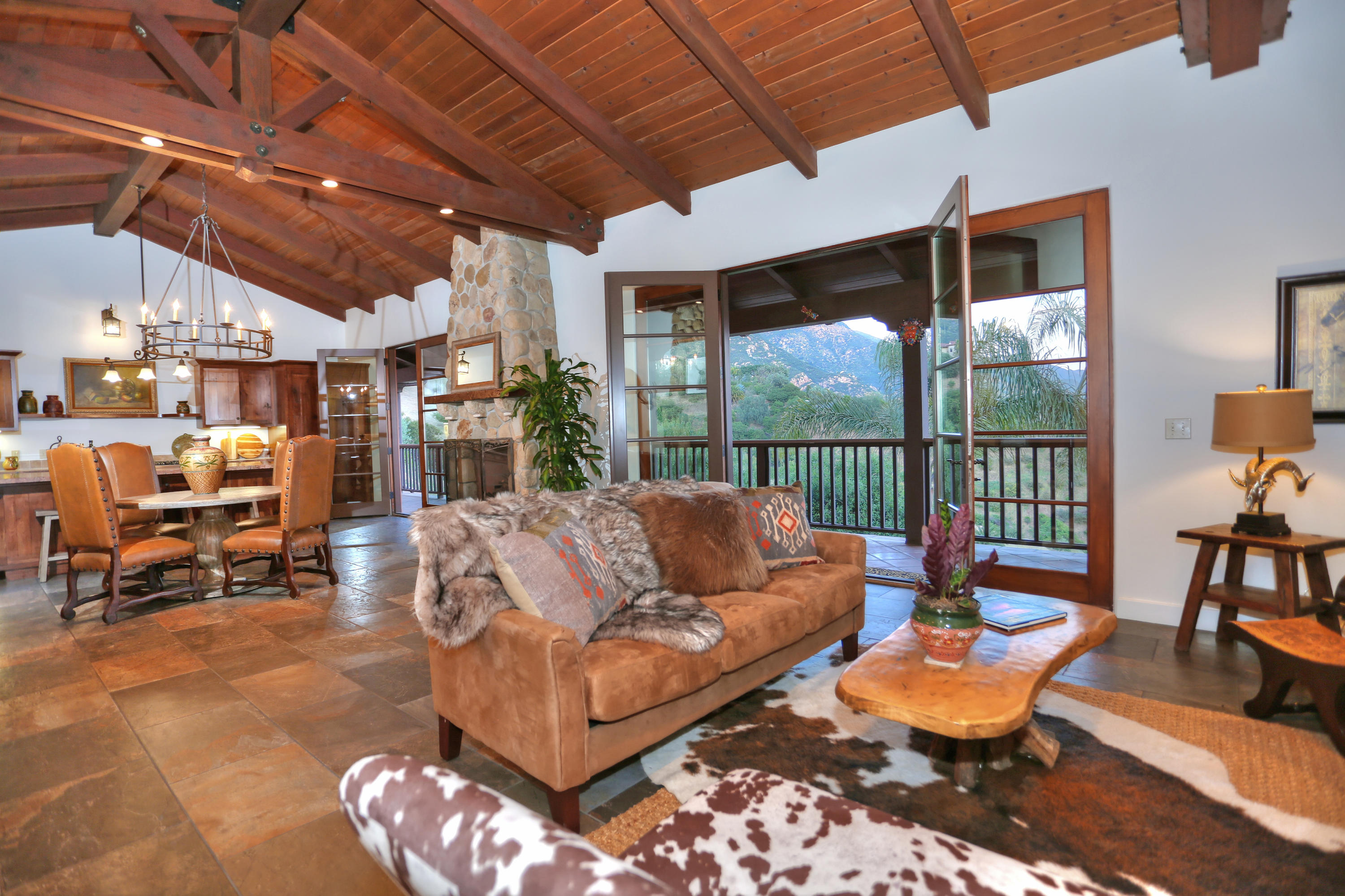 2220 Gibraltar Road Santa Barbara, CA 93103 - Photo 6 of 21 a outdoor living space with furniture and a fireplace