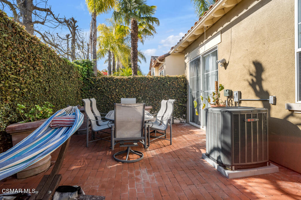 1138 Corte Riviera Camarillo, CA 93010 - Photo 33 of 40 a view of a patio with a table and chairs