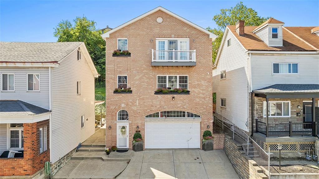 11 Natchez Street Pittsburgh, PA 15211 - Photo 25 of 25 a front view of a house with a garage