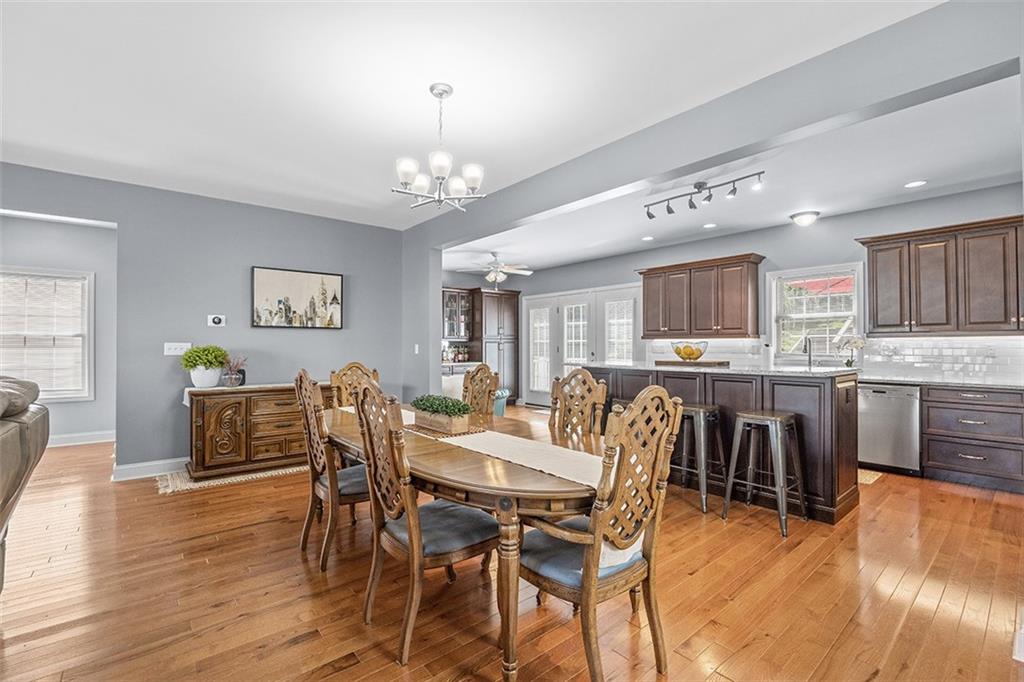 11 Natchez Street Pittsburgh, PA 15211 - Photo 7 of 25 a view of a dining room with furniture and wooden floor