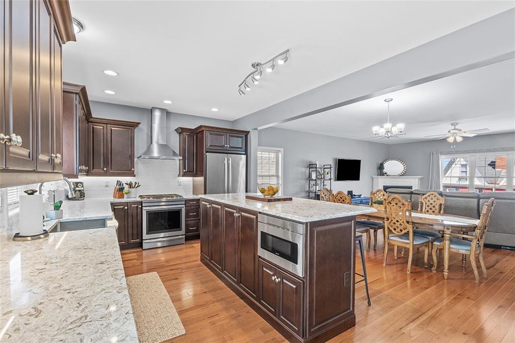 11 Natchez Street Pittsburgh, PA 15211 - Photo 8 of 25 a large kitchen with stainless steel appliances lots of counter top space